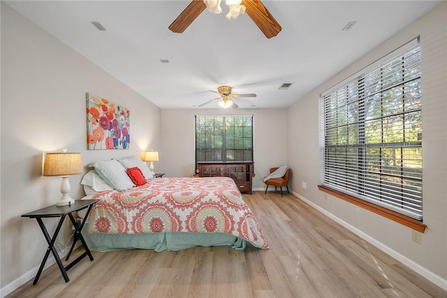 bedroom featuring ceiling fan and light wood-type flooring