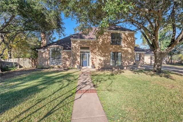 view of front facade with a front yard