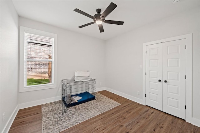 3518 Parmer Creek Ct, College Station, TX 77845 - unfurnished bedroom featuring multiple windows, wood finished floors, and a closet