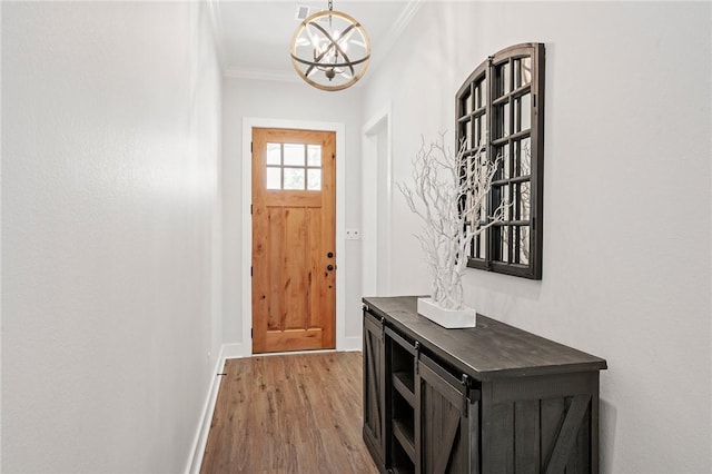 3518 Parmer Creek Ct, College Station, TX 77845 - entryway with a chandelier, ornamental molding, and wood finished floors