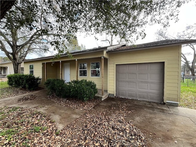 ranch-style home with a garage