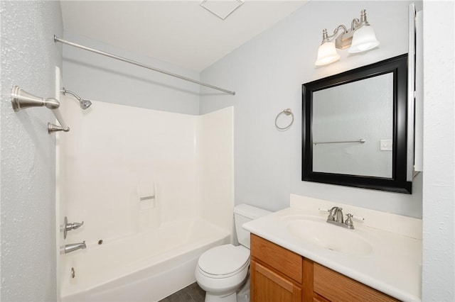 full bathroom with toilet, vanity, and shower / bathing tub combination