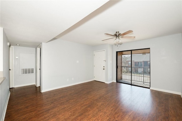 unfurnished room with ceiling fan and dark hardwood / wood-style floors