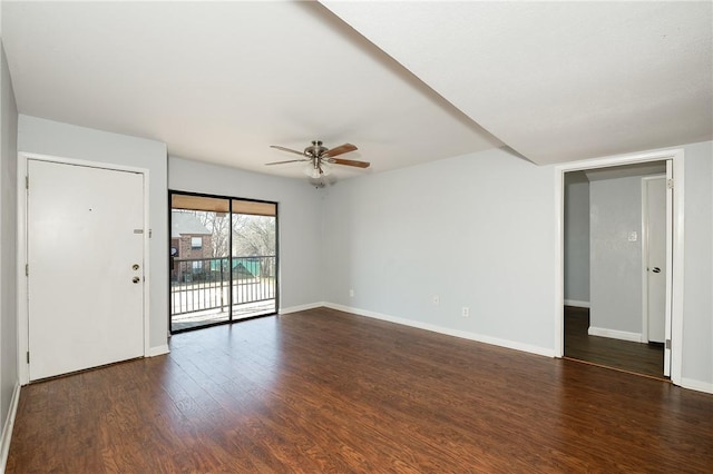 unfurnished room featuring ceiling fan and dark hardwood / wood-style flooring