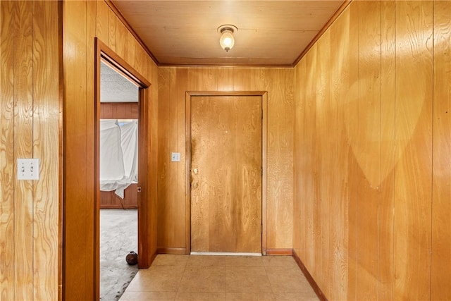 707 Norwood Ln, Hearne, TX 77859 - hallway with wooden walls and baseboards