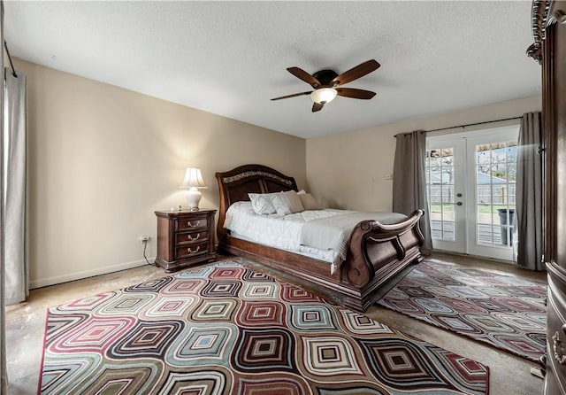 bedroom featuring access to exterior, ceiling fan, french doors, and a textured ceiling