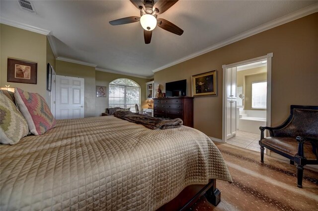 3151 Running River Ln, Washington, TX 77880 - bedroom with ornamental molding, ensuite bathroom, baseboards, and a ceiling fan