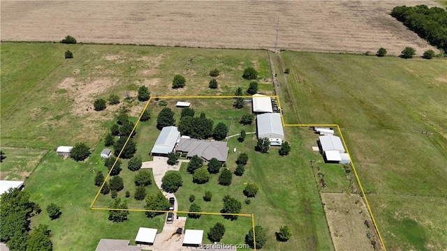 birds eye view of property featuring a rural view