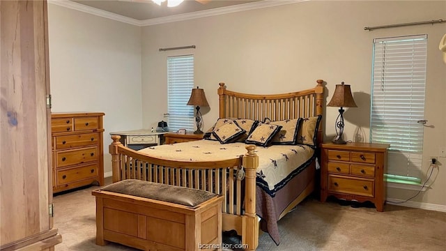 carpeted bedroom featuring crown molding