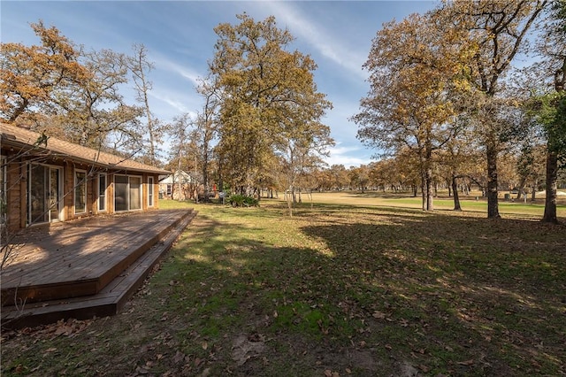 view of yard featuring a deck