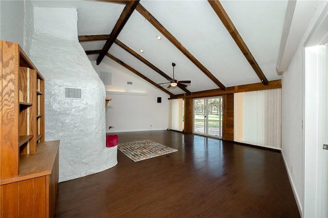 unfurnished living room featuring ceiling fan, dark wood-type flooring, high vaulted ceiling, and beamed ceiling