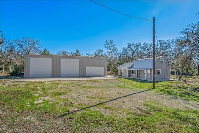 garage with a yard