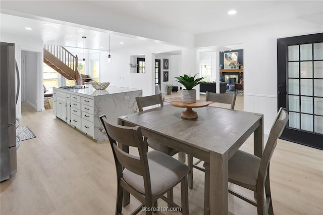 dining room featuring light wood-type flooring