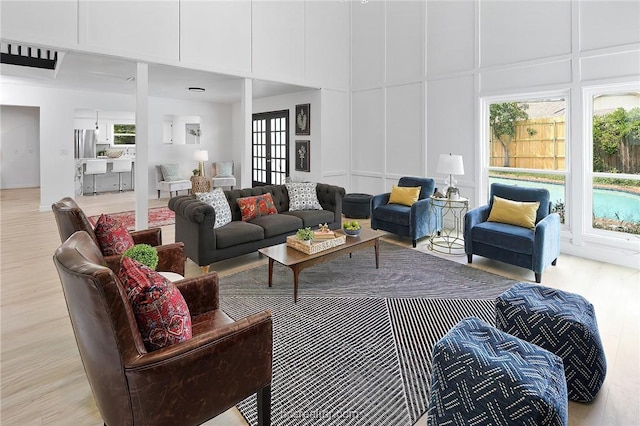 living room with light hardwood / wood-style floors