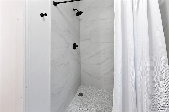 bathroom with a shower with curtain