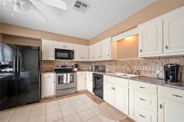 kitchen with visible vents, decorative backsplash, black appliances, a ceiling fan, and a sink