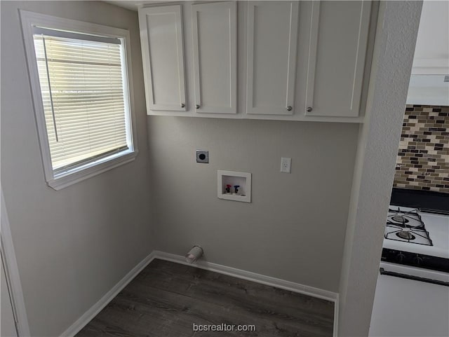 clothes washing area with hookup for an electric dryer, hookup for a washing machine, and dark hardwood / wood-style flooring