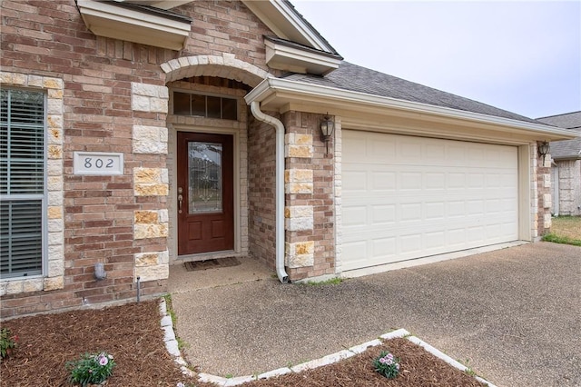 property entrance with a garage