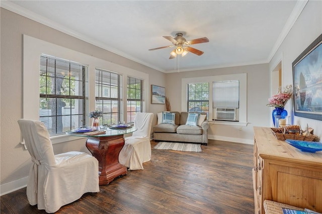 dining area with a wealth of natural light, ceiling fan, dark wood-type flooring, and ornamental molding