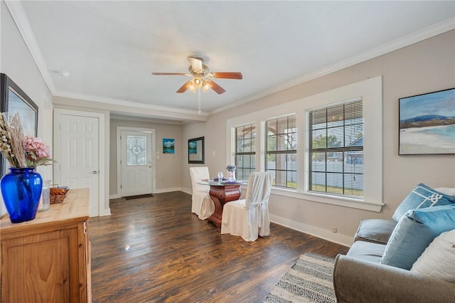 dining area featuring crown molding, ceiling fan, and dark hardwood / wood-style floors