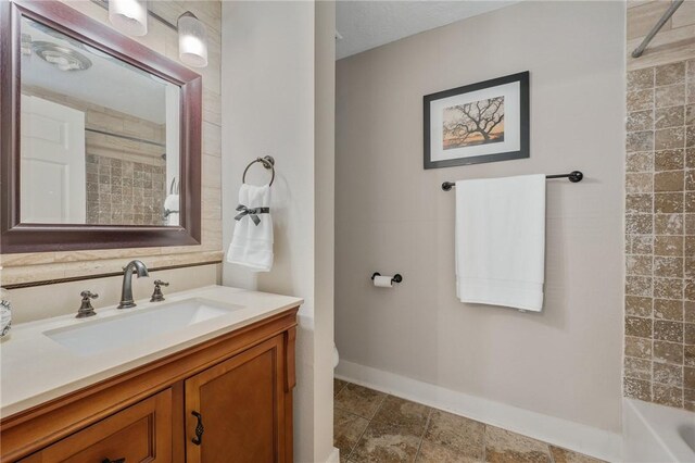 bathroom with shower / washtub combination and vanity