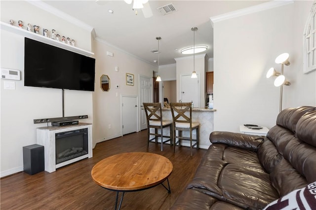 1198 Jones Butler Rd Unit 3103, College Station, TX 77840 - living room featuring ceiling fan, dark wood finished floors, ornamental molding, and baseboards