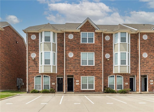 1198 Jones Butler Rd Unit 3103, College Station, TX 77840 - view of building exterior with uncovered parking
