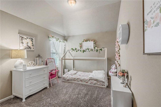 carpeted bedroom featuring vaulted ceiling