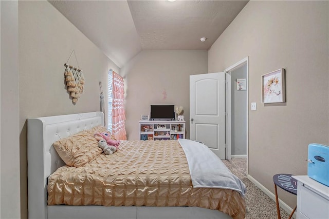 carpeted bedroom featuring lofted ceiling