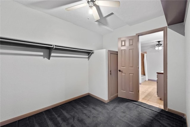 spacious closet with carpet and ceiling fan