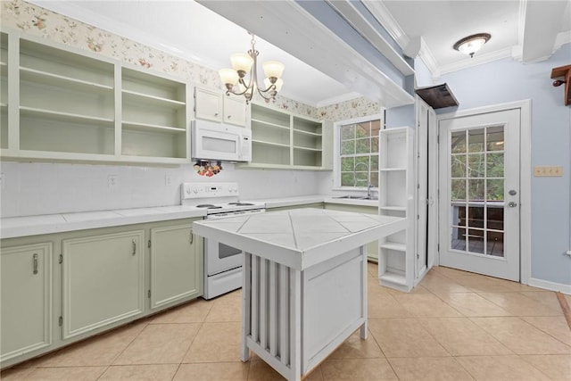 kitchen with white appliances, crown molding, a kitchen island, hanging light fixtures, and light tile patterned flooring