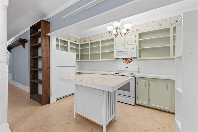 kitchen featuring white appliances, a kitchen island, green cabinets, and crown molding