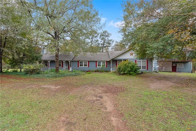 single story home with a front yard