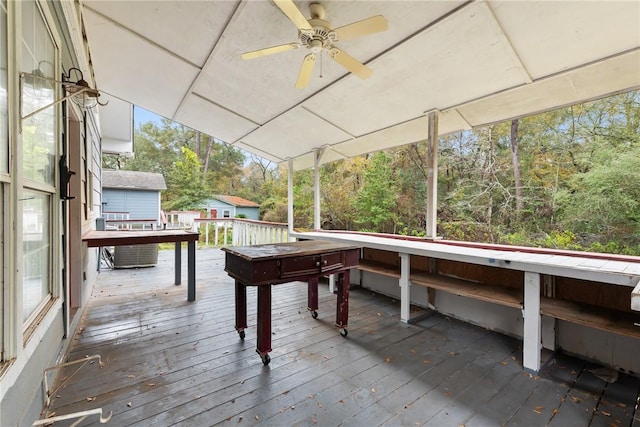 deck featuring ceiling fan and central air condition unit