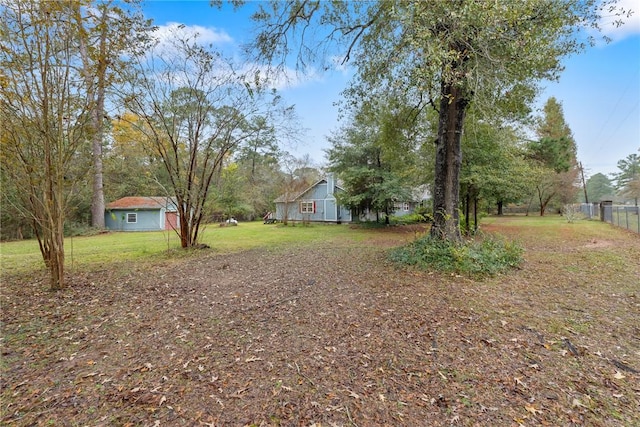 view of yard with an outdoor structure