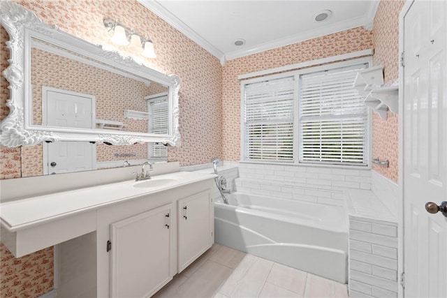 bathroom with vanity, a tub to relax in, tile patterned floors, and crown molding