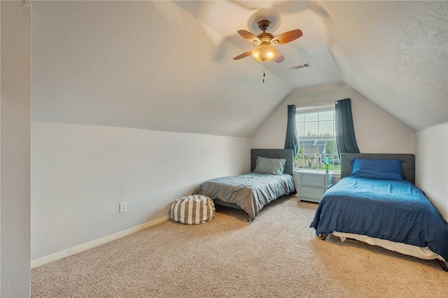 1905 Kingsgate Dr, Bryan, TX 77807 - carpeted bedroom featuring lofted ceiling, a ceiling fan, and baseboards