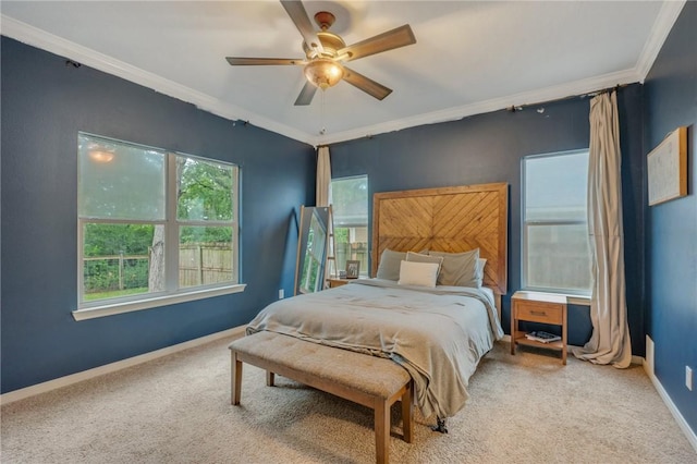 1905 Kingsgate Dr, Bryan, TX 77807 - carpeted bedroom with ornamental molding, baseboards, and a ceiling fan