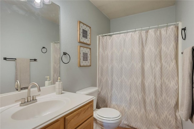 1905 Kingsgate Dr, Bryan, TX 77807 - full bath featuring toilet, vanity, and curtained shower