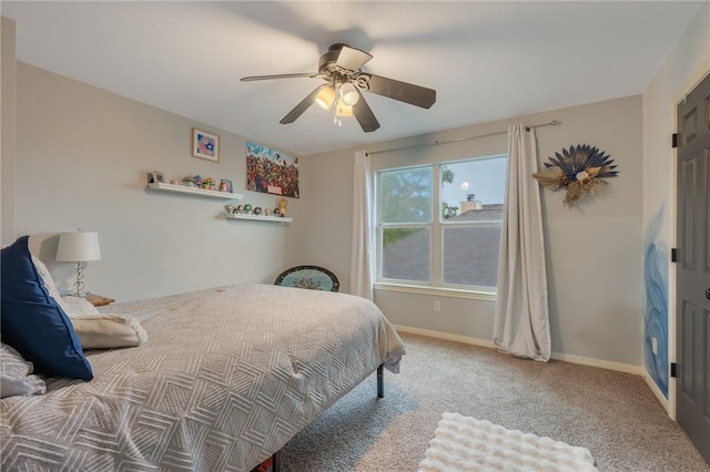 1905 Kingsgate Dr, Bryan, TX 77807 - carpeted bedroom featuring baseboards and ceiling fan