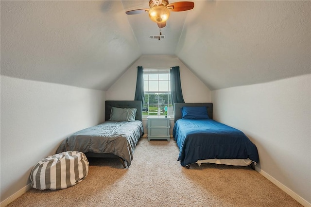 1905 Kingsgate Dr, Bryan, TX 77807 - bedroom with carpet, ceiling fan, lofted ceiling, and baseboards