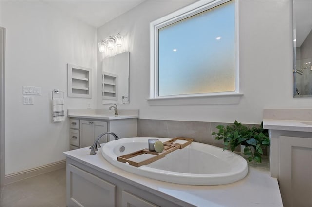 bathroom with a bathtub and vanity