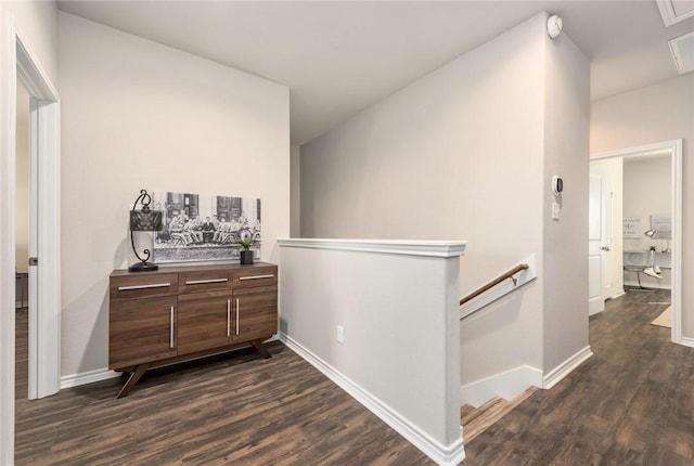 hallway featuring dark hardwood / wood-style flooring