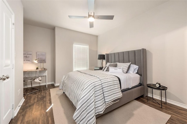 bedroom featuring dark hardwood / wood-style flooring and ceiling fan