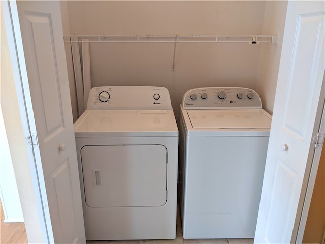 laundry room with washer and clothes dryer