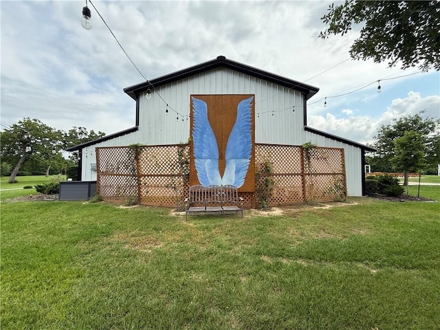 601 E Collard St, Madisonville, TX 77864 - view of pole building with a lawn