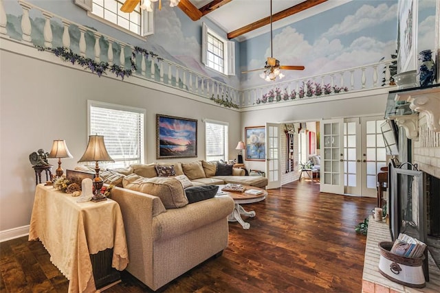 601 E Collard St, Madisonville, TX 77864 - living area with a ceiling fan, a high ceiling, beamed ceiling, french doors, and wood finished floors