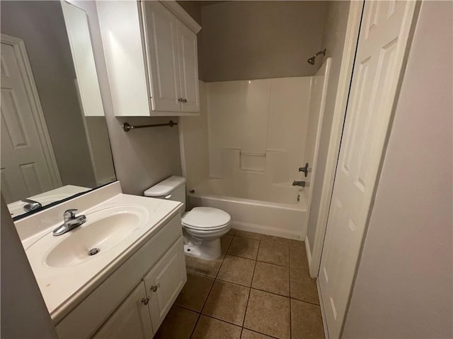bathroom with shower / bathing tub combination, vanity, tile patterned flooring, and toilet