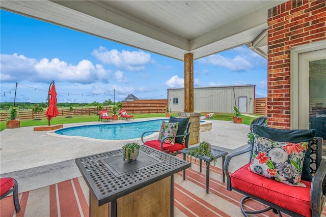 2181 Fm 166, Caldwell, TX 77836 - view of pool featuring a patio area, a fenced backyard, and an outdoor structure