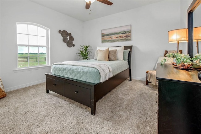 2181 Fm 166, Caldwell, TX 77836 - bedroom featuring carpet flooring, baseboards, and a ceiling fan